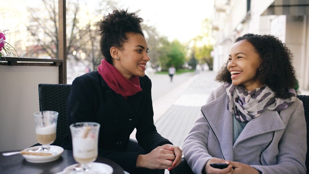 friends talking at outdoor cafe