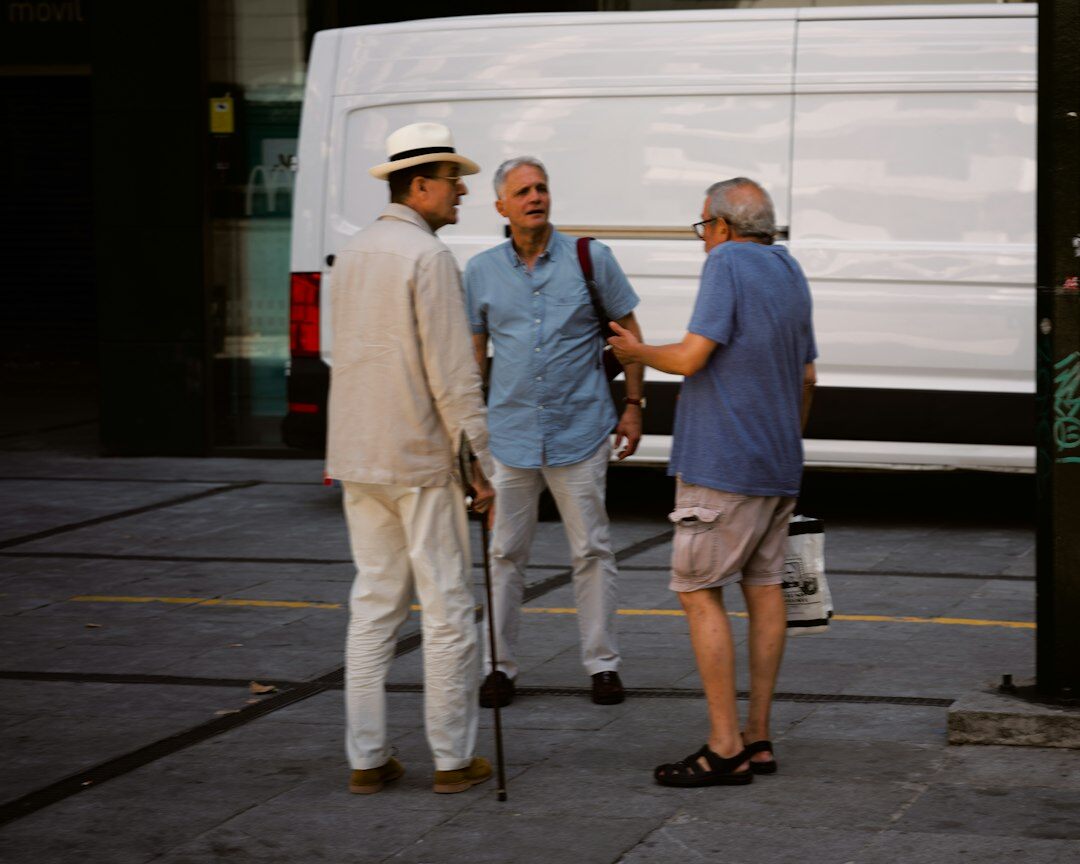 group of elderly men talking