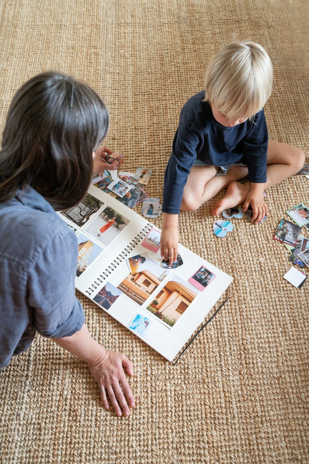 family looking at photo album