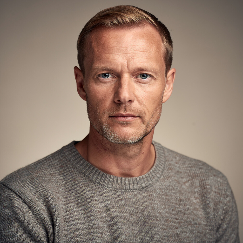 Studio portrait of a Danish man, photo editor